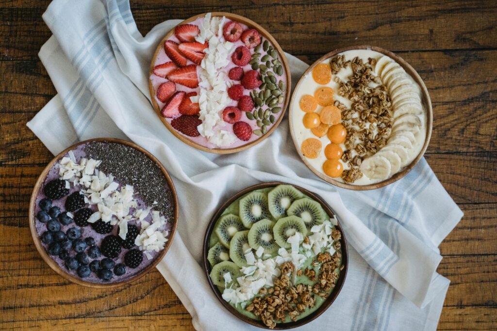 Ingredients for chia pudding recipe including chia seeds and berries